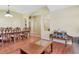 Elegant dining area adjacent to the living room, perfect for hosting dinner parties and Gathering gatherings at 30445 Tremont Dr, Wesley Chapel, FL 33543