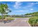 Street view showing a variety of commercial businesses and retail shops with ample parking at 30445 Tremont Dr, Wesley Chapel, FL 33543