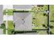 Aerial view of backyard featuring green grass, and partial view of roof at 30989 Summer Sun Loop, Wesley Chapel, FL 33545