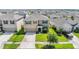 Aerial view of community featuring well-manicured lawns and nicely spaced homes at 30989 Summer Sun Loop, Wesley Chapel, FL 33545