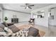 Open living room with kitchen view, neutral décor, and stylish furniture at 3100 70Th N St, St Petersburg, FL 33710