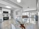 Bright living room with modern decor, terrazzo floors, and lots of natural light at 3100 70Th N St, St Petersburg, FL 33710