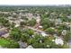 Sweeping aerial view of the community featuring tree-lined streets and the city skyline at 311 W Ida St, Tampa, FL 33603