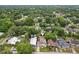 Aerial view of the property showcasing its location among lush greenery and neighborhood at 311 W Ida St, Tampa, FL 33603