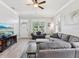 Bright living room featuring two sofas and neutral walls and light-colored floors at 311 W Ida St, Tampa, FL 33603