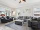 Bright living room featuring two sofas and neutral walls and light-colored floors at 311 W Ida St, Tampa, FL 33603