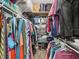 Spacious walk-in closet with extensive shelving and hanging storage for organized clothing and accessories at 311 W Ida St, Tampa, FL 33603