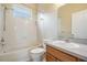 Bathroom with a tub and shower combo and single sink vanity at 31331 Anniston Dr, Wesley Chapel, FL 33543