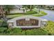 The Alchester Place neighborhood sign is surrounded by manicured landscaping at 31331 Anniston Dr, Wesley Chapel, FL 33543