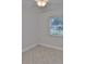 Cozy room with natural lighting and tiled flooring offering a peaceful ambiance at 3209 W Tyson Ave, Tampa, FL 33611