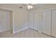 Neutral bedroom with two closets and access to private bathroom at 3209 W Tyson Ave, Tampa, FL 33611
