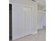 Open closet with slider doors. Doorway to hallway visible at 3209 W Tyson Ave, Tampa, FL 33611