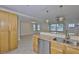 Bright kitchen features granite countertops, stainless steel appliances, and ample cabinet space at 3209 W Tyson Ave, Tampa, FL 33611