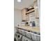 Well-organized laundry room with modern washer/dryer and ample storage at 34 Harbor Oaks Cir, Safety Harbor, FL 34695