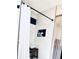 Modern shower with white marble tile, sleek fixtures, and a built-in niche at 34 Harbor Oaks Cir, Safety Harbor, FL 34695