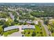Overhead shot showcasing the community with tree-lined streets and well-maintained landscaping at 3410 Stonehaven E Ct # A, Palm Harbor, FL 34684