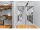 Walk-in closet with wood floors and custom shelving, providing ample storage space at 3410 Stonehaven E Ct # A, Palm Harbor, FL 34684