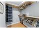 Spacious walk-in closet with custom shelving and organization for clothing and accessories at 3410 Stonehaven E Ct # A, Palm Harbor, FL 34684