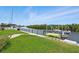 Dock with multiple boats and kayaks, offering direct access to the water at 3936 Crooked Island Dr, Punta Gorda, FL 33950