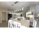 Spacious kitchen features sleek countertops, modern appliances, ample storage, and adjacent dining area at 3936 Crooked Island Dr, Punta Gorda, FL 33950
