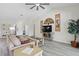 Spacious living room featuring neutral tones, vaulted ceilings, and elegant decor for a comfortable atmosphere at 3936 Crooked Island Dr, Punta Gorda, FL 33950