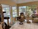 Sunroom with access to the pool and abundant natural light throughout at 405 Bryn Mawr Is, Bradenton, FL 34207