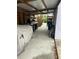 Garage featuring storage, workspaces, and access to the outdoors at 405 Bryn Mawr Is, Bradenton, FL 34207