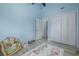 Bedroom with vaulted ceiling, closet and doorways and colorful rug at 4100 Miramar Way, St Petersburg, FL 33705