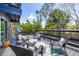 Relaxing outdoor deck area with ample seating surrounded by lush greenery at 4100 Miramar Way, St Petersburg, FL 33705