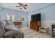 Comfortable living room showcasing pale blue walls, laminate floors, and modern furniture at 4100 Miramar Way, St Petersburg, FL 33705