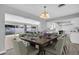 Open-concept dining room featuring modern furnishings and seamless flow to living spaces and backyard at 4200 49Th S Ave, St Petersburg, FL 33711