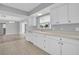 Bright kitchen featuring a window above the sink and lots of cabinet space at 4200 49Th S Ave, St Petersburg, FL 33711