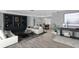 Stylishly staged living room with contemporary furniture, built-in shelving, and modern decor at 4200 49Th S Ave, St Petersburg, FL 33711