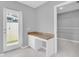 Functional office space with built-in desk, natural light, and access to closet at 4200 49Th S Ave, St Petersburg, FL 33711
