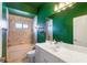 Bright bathroom with bathtub, stand up shower, and double vanity at 4264 Michaler St, North Port, FL 34286