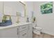 Modern bathroom featuring stylish vanity, gold hardware, and elegant fixtures at 4513 21St N St, St Petersburg, FL 33714