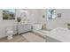 Bright bathroom with a soaking tub, marble walls, and modern fixtures at 4513 21St N St, St Petersburg, FL 33714