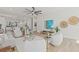 Open concept living room featuring modern decor, comfortable seating, and a seamless flow at 4513 21St N St, St Petersburg, FL 33714