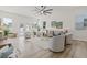 Spacious living room with hardwood floors, modern furniture, and ample natural light at 4513 21St N St, St Petersburg, FL 33714