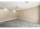 Neutral bedroom with new carpet, ceiling fan, overhead lights and electrical outlets along base trim at 4521 Tidal Pond Rd, New Port Richey, FL 34652