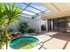 Open-air courtyard featuring mini pool, patio area, ideal for outdoor relaxation and entertainment at 4521 Tidal Pond Rd, New Port Richey, FL 34652