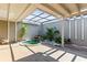 Enclosed courtyard with mini pool and attractive foliage at 4521 Tidal Pond Rd, New Port Richey, FL 34652