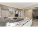 Spacious living room has vaulted ceilings, and flows into the kitchen at 4521 Tidal Pond Rd, New Port Richey, FL 34652