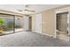 Main bedroom with access to a private courtyard and en-suite bathroom, offering both comfort and convenience at 4521 Tidal Pond Rd, New Port Richey, FL 34652
