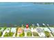 Waterfront property featuring a private dock with deep water access to the open bay, offering boating and fishing at 4823 Arlington Rd, Palmetto, FL 34221