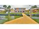 A spacious backyard and dock with boatlifts overlooking the beautiful open water view at 4823 Arlington Rd, Palmetto, FL 34221