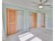 Spacious bedroom with carpet and closets, providing ample storage at 4823 Arlington Rd, Palmetto, FL 34221