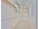 Walk-in closet with wire shelving and carpeted floors at 4823 Arlington Rd, Palmetto, FL 34221