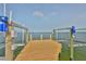 Dock featuring boatlifts over the beautiful open water at 4823 Arlington Rd, Palmetto, FL 34221