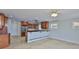 Open kitchen featuring wood cabinets, stainless steel appliances, and breakfast bar at 4823 Arlington Rd, Palmetto, FL 34221